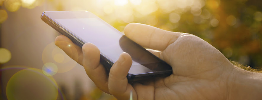 A hotel customer holding an iphone