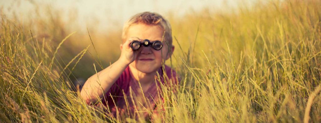 Young boy watching his local competition