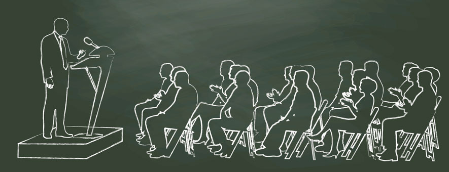 Hotel industry professionals listening to talks