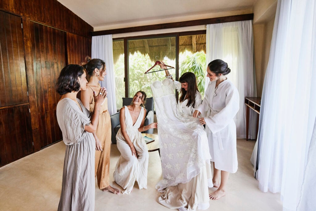 Bride-to-be and bridesmaids gathered in a hotel room.