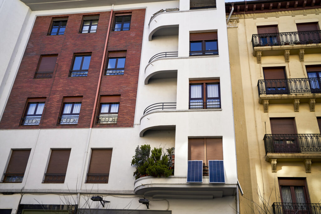 Image of a micro hotel exterior showing windows and balconies