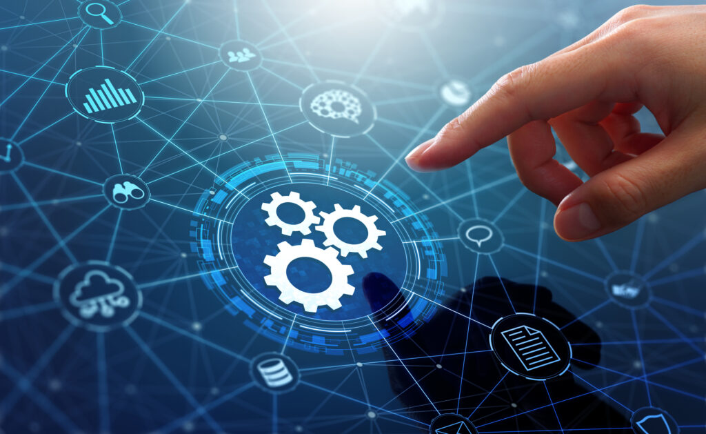 A finger about to press on a digital screen representing a system